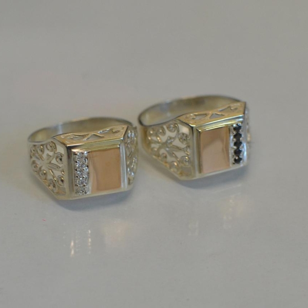 Срібний перстень з напайками із золота