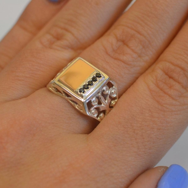 Срібний перстень з напайками із золота