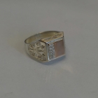 Срібний перстень з напайками із золота