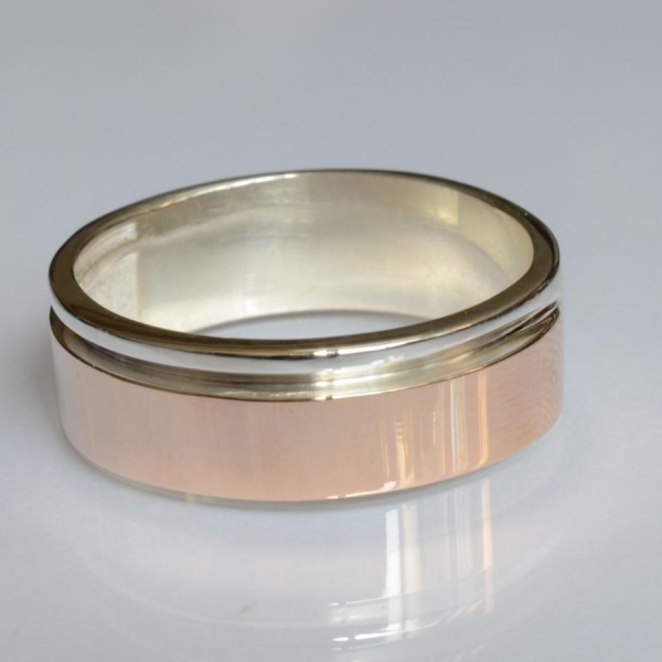 Серебряное обручальное кольцо с золотом