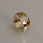 Обручальное кольцо из серебра с золотом