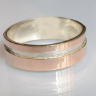 Срібна обручка з золотом