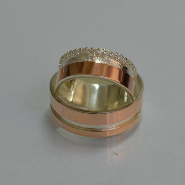 Пара срібних обручок з золотом