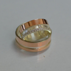 Пара срібних обручок з золотом