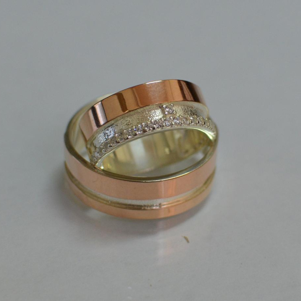 Пара срібних обручок з золотом