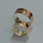 Пара срібних обручок з золотом