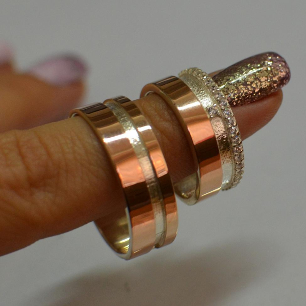 Пара срібних обручок з золотом