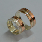 Пара срібних обручок з золотом