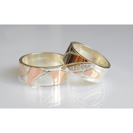 Пара обручальных колец из серебра с золотом