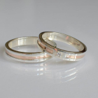 Пара срібних обручок з золотом