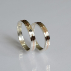 Пара срібних обручок з золотом