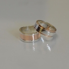 Пара срібних обручок з золотими пластинами