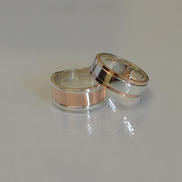 Пара срібних обручок з золотими пластинами
