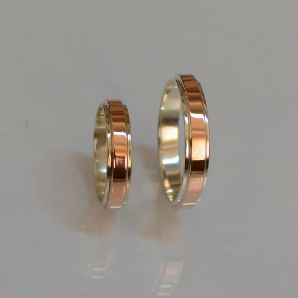 Срібна обручка  з золотими накладками