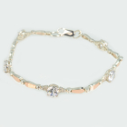 Срібний браслет з золотими пластинами