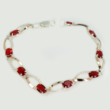 Срібний браслет з золотими пластинами