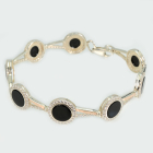 Срібний браслет з золотими пластинами та фіанітами