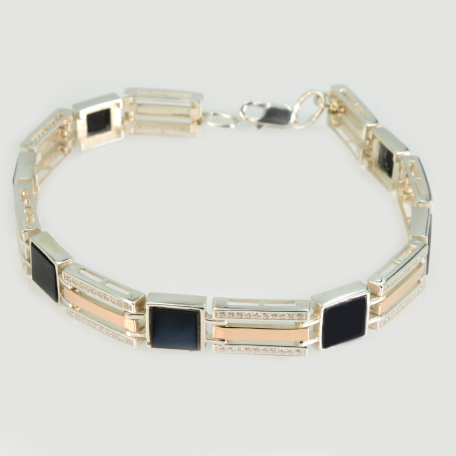 Серебряный браслет с золотыми пластинами и вставками из оникса