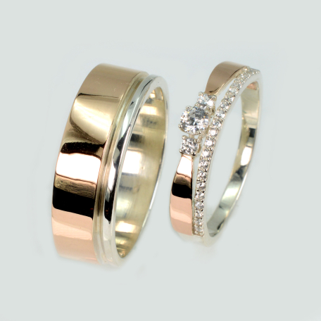 Пара серебряных обручальных колец с золотыми пластинами