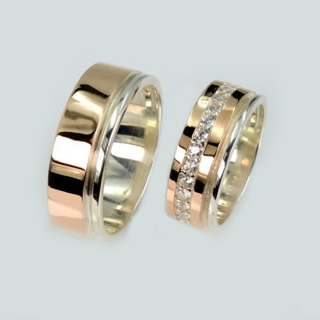 Пара обручальных колец из серебра с золотом