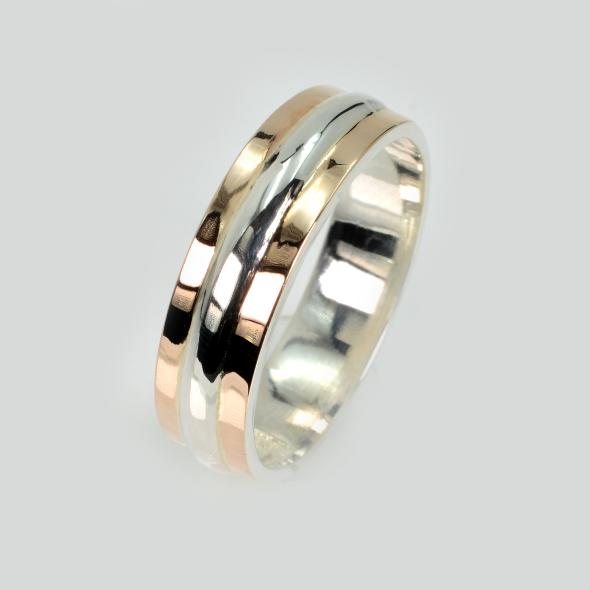 Обручка із срібла з золотом