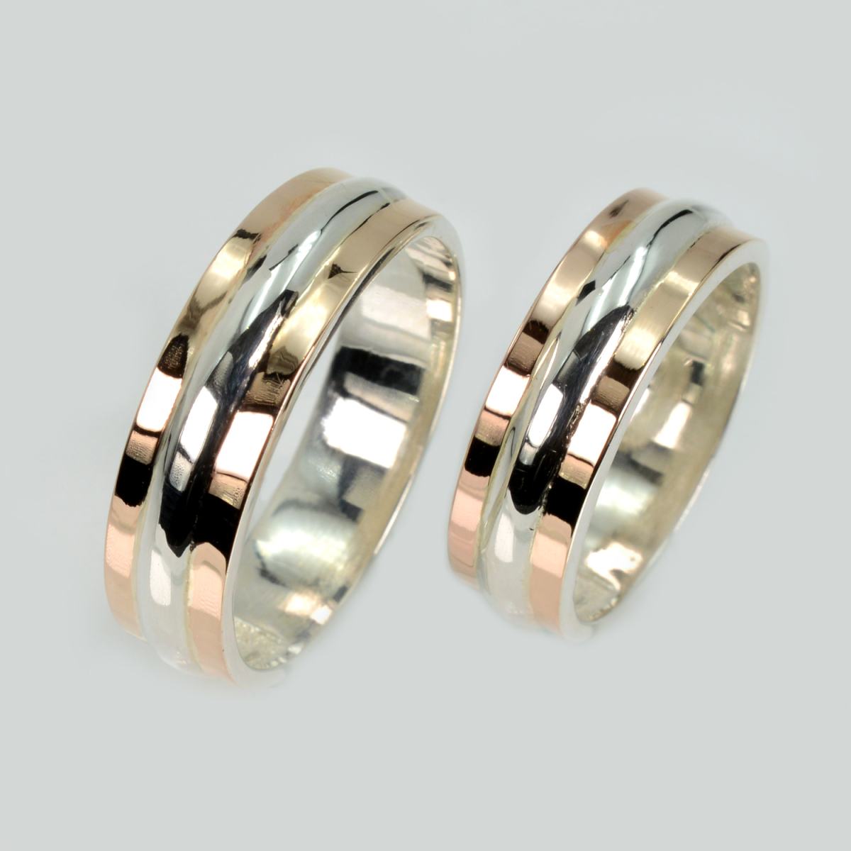 Пара срібних обручок з пластинами золота