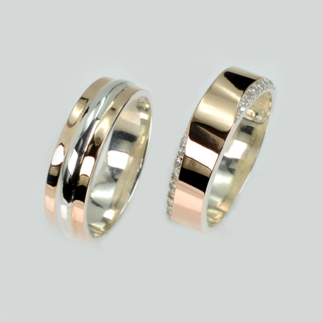 Пара обручок зі срібла та золота