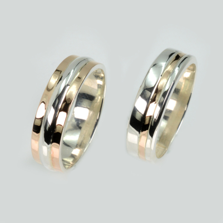 Пара обручок зі срібла та золота