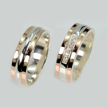 Пара обручок зі срібла та золота