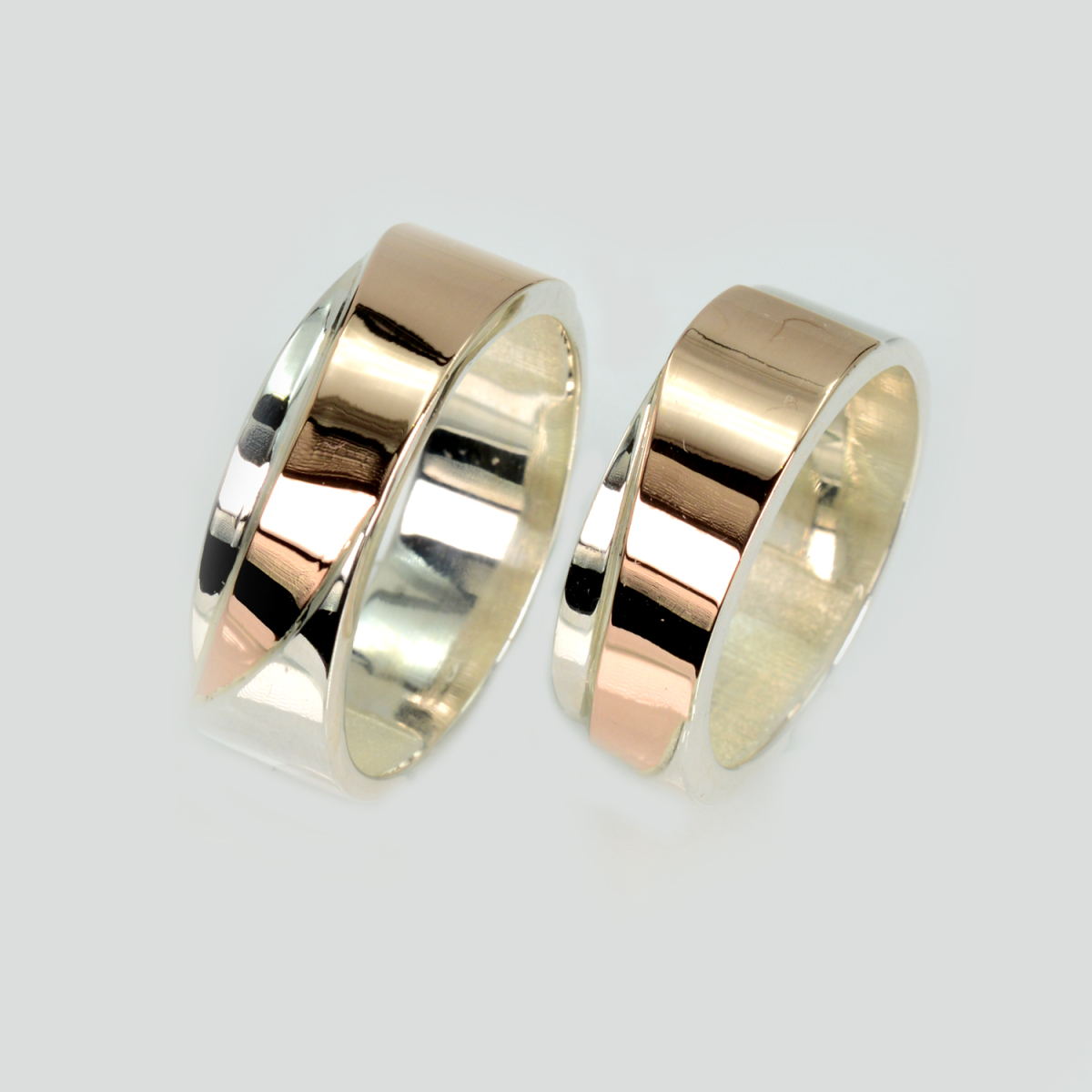 Пара срібних обручок з пластинами золота