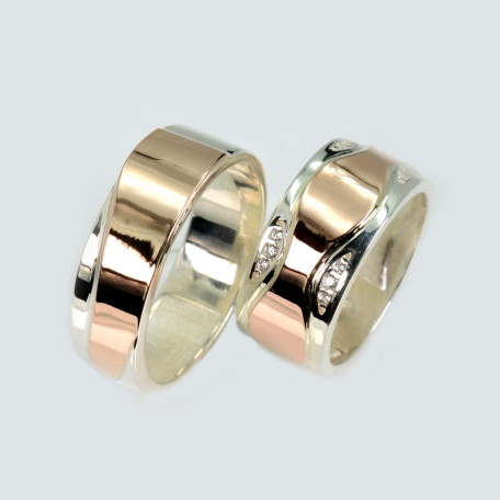 Пара обручок зі срібла та золота