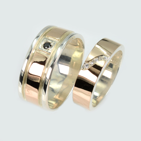 Пара обручок зі срібла та золота