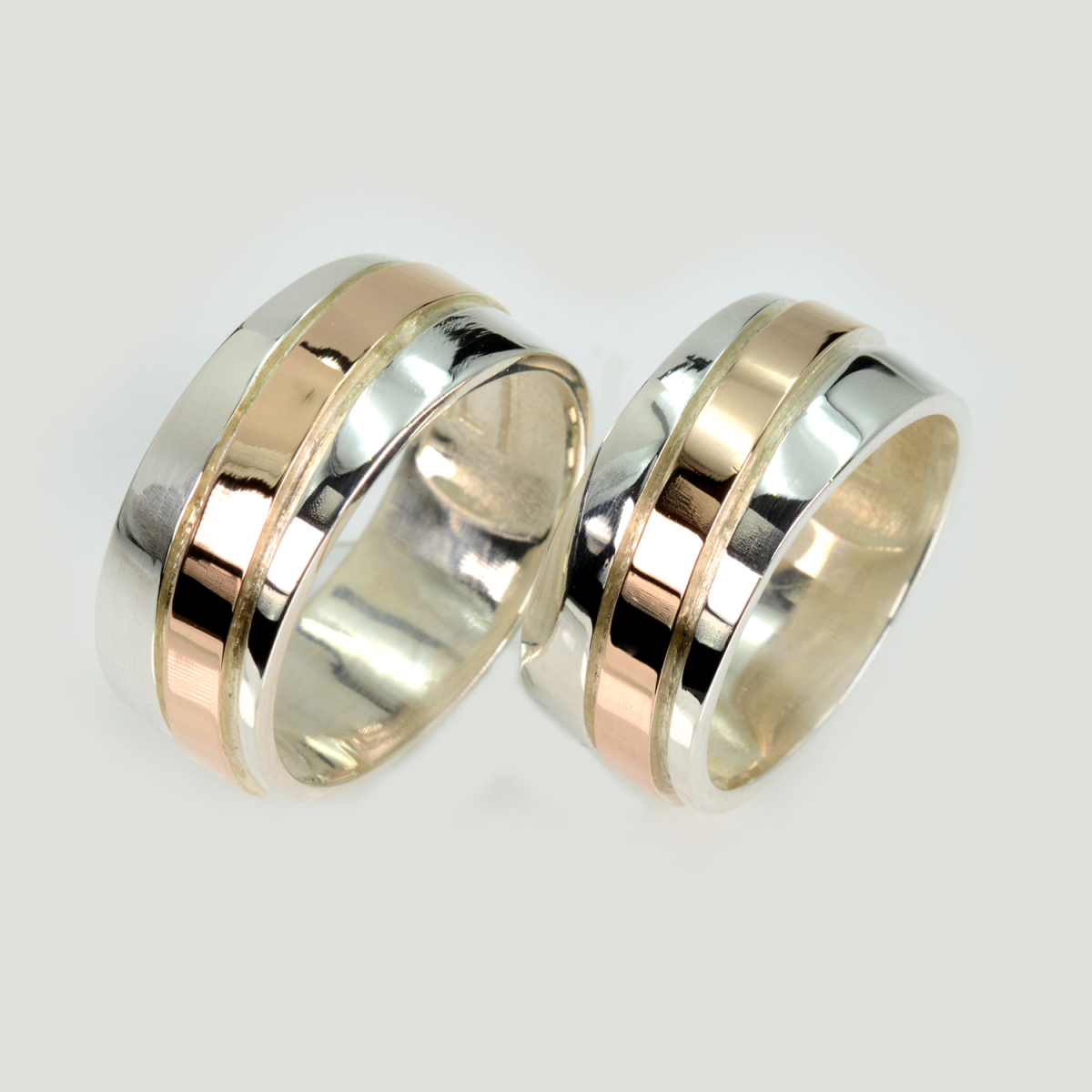 Пара срібних обручок з пластинами золота