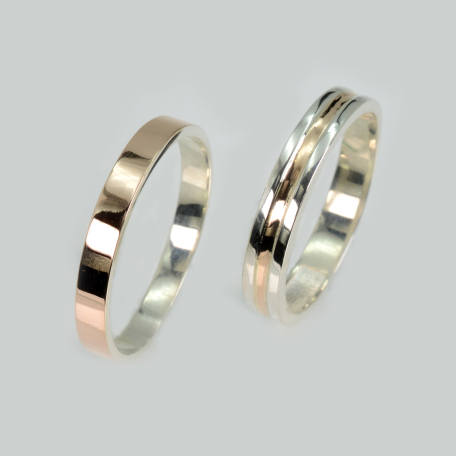 Пара обручок зі срібла та золота