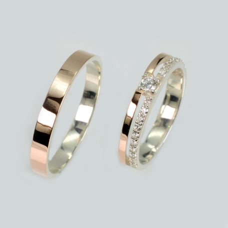 Пара серебряных обручальных колец с золотыми пластинами