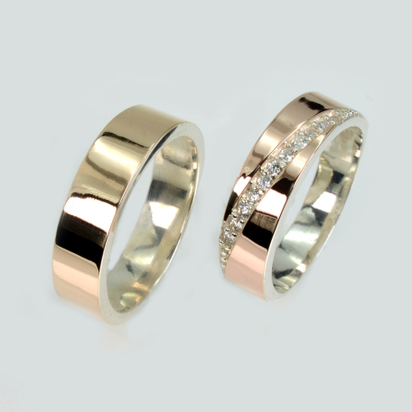 Пара обручальных колец из серебра с золотом