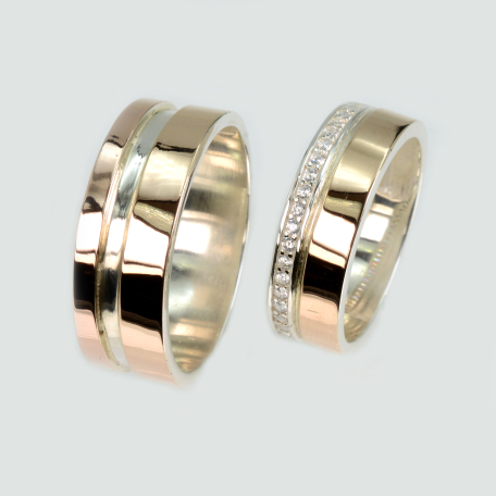 Пара обручальных колец из серебра и золота