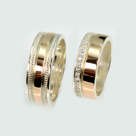 Пара обручальных колец из серебра и золота