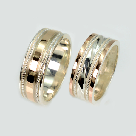 Пара обручальных колец из серебра и золота