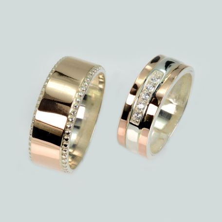 Пара обручок зі срібла та золота