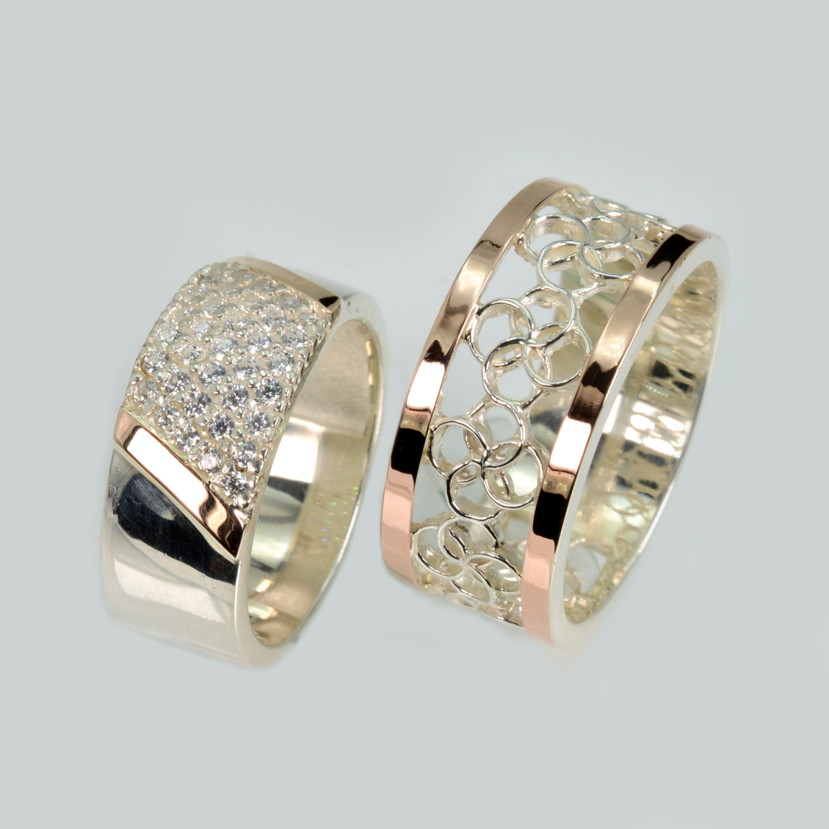 Пара срібних обручок з золотом