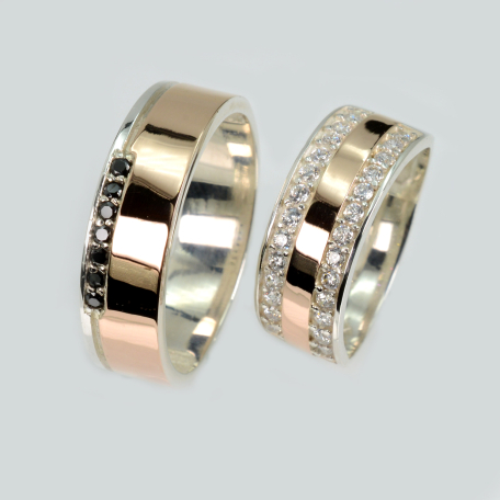 Пара обручок зі срібла та золота