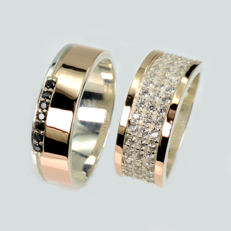 Пара обручальных колец из серебра и золота