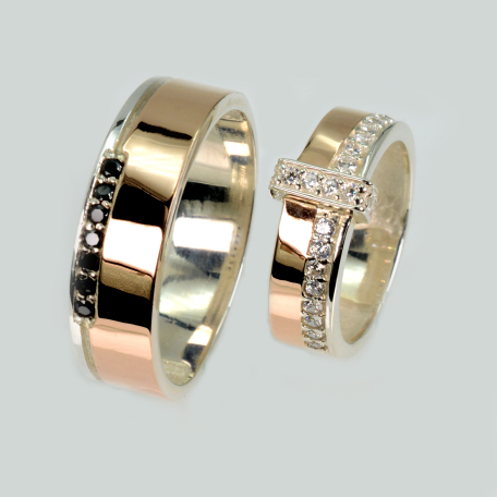 Пара обручальных колец из серебра и золота