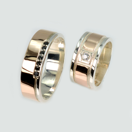 Пара обручальных колец из серебра и золота