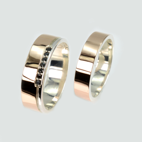 Пара обручок зі срібла та золота