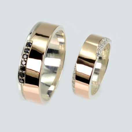 Пара обручальных колец из серебра и золота