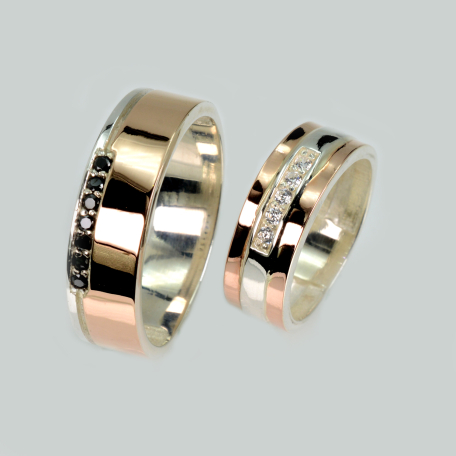 Пара обручальных колец из серебра и золота