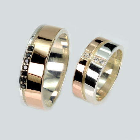 Пара обручальных колец из серебра и золота