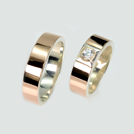 Пара обручальных колец из серебра и золота